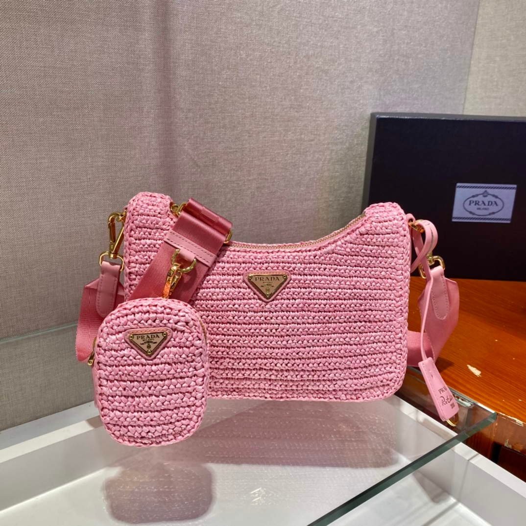 65324ed018c94.jpg Replica Prada 1BH204 Prada Re-Edition 2005 Raffia Bag in Pink - 图片 1