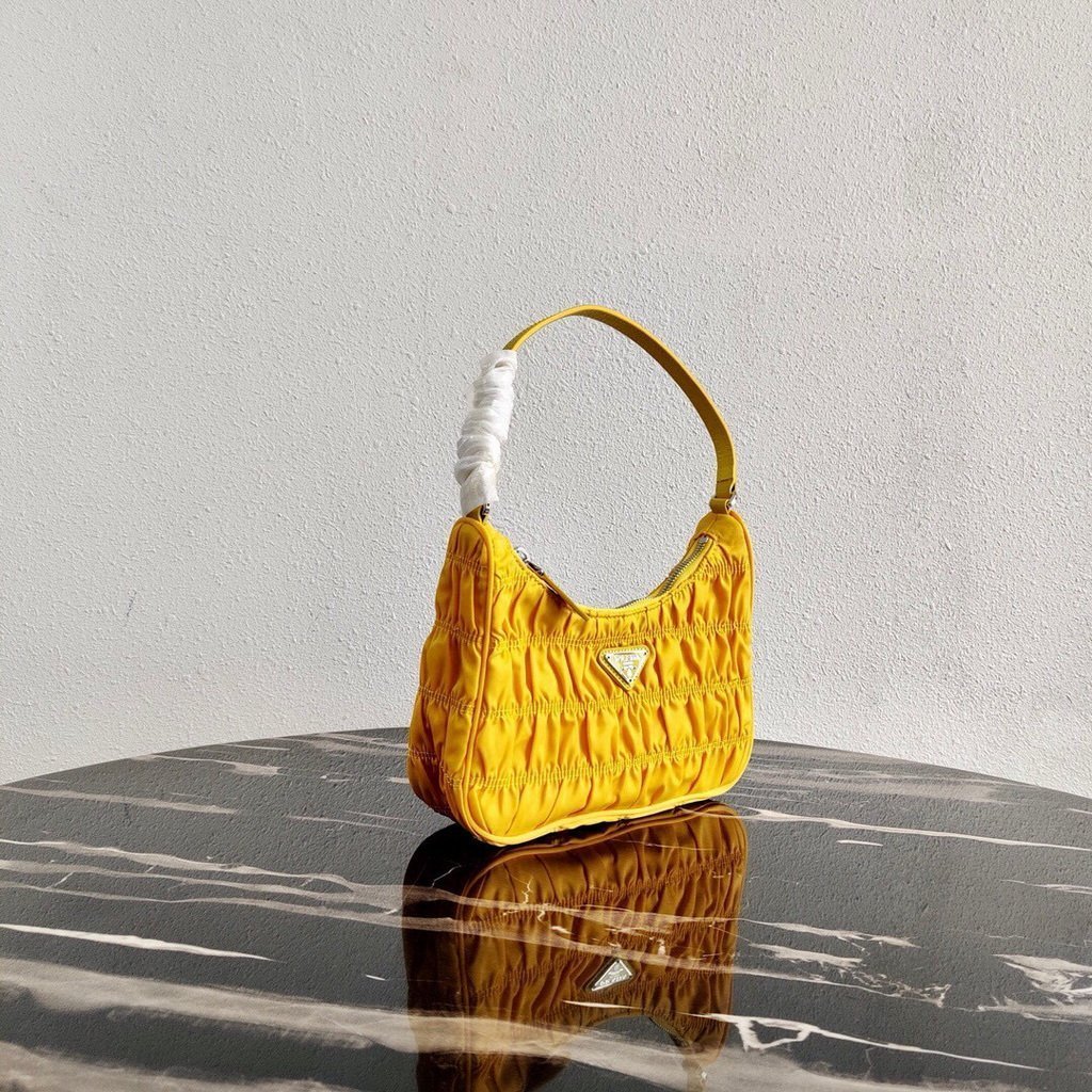 65324f32097c0.jpg Replica Prada 1NE204 Prada Nylon and Saffiano Leather Mini Bag in Yellow - 图片 1