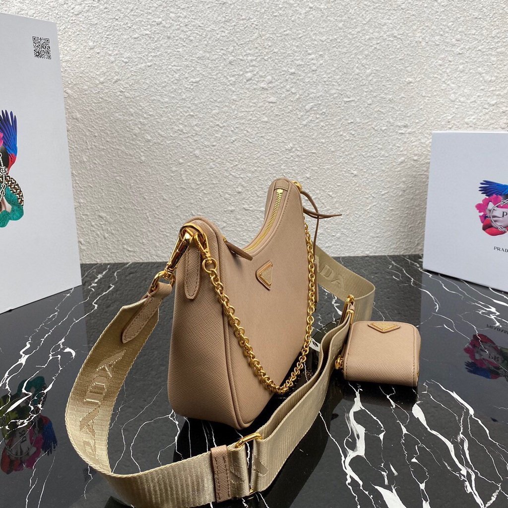 65324fca9573c.jpg Replica Prada 1BH204 Prada Re-Edition 2005 Saffiano leather Bag in Apricot - 图片 1