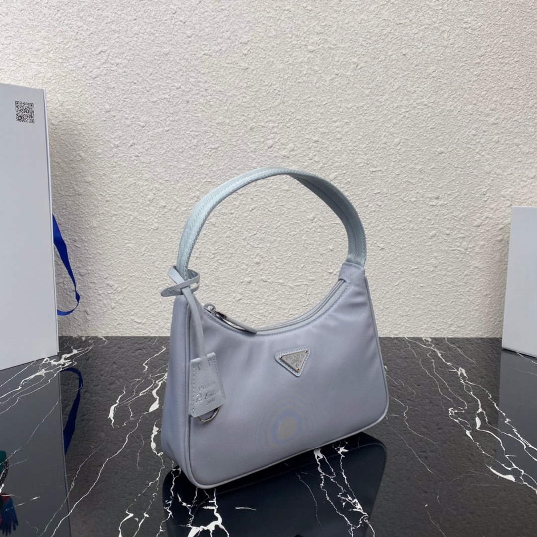 653254be7b65d.jpg Replica Prada 1NE515 Re-Nylon Re-Edition 2000 mini-bag Light Blue - 图片 1