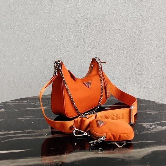 653256cfeae65.jpg Replica Prada 1BH204 Prada Re-Edition 2005 Nylon Bag Orange - 图片 1