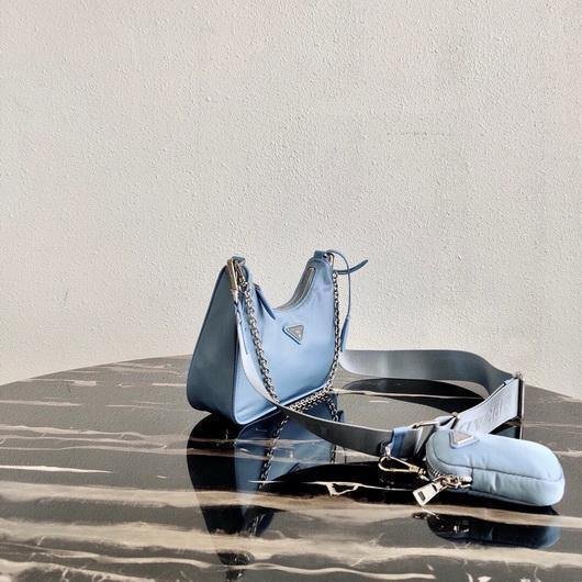 653256d53d52d.jpg Replica Prada 1BH204 Prada Re-Edition 2005 Nylon Bag Light Blue - 图片 1