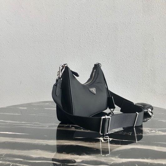 653256e29f398.jpg Replica Prada 1BH204 Prada Re-Edition 2005 Nylon Bag Black - 图片 1