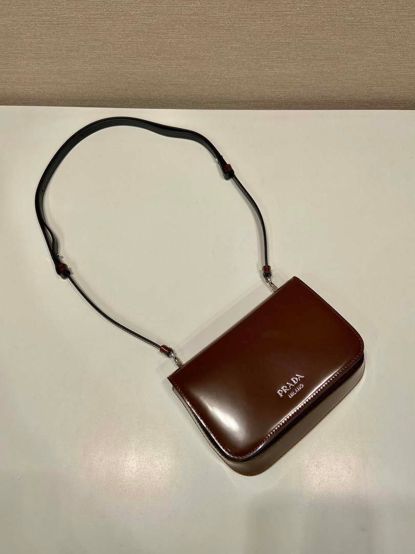 65325aef34163.jpg Replica Prada 2VD061 Black Brushed Leather Mini-bag With Shoulder Strap Brown - 图片 1